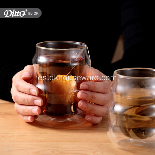 Taza de té de vidrio de doble pared con diseño curvo